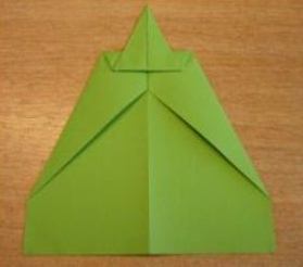 Fold Tip Half Above to Make a Paper Airplane